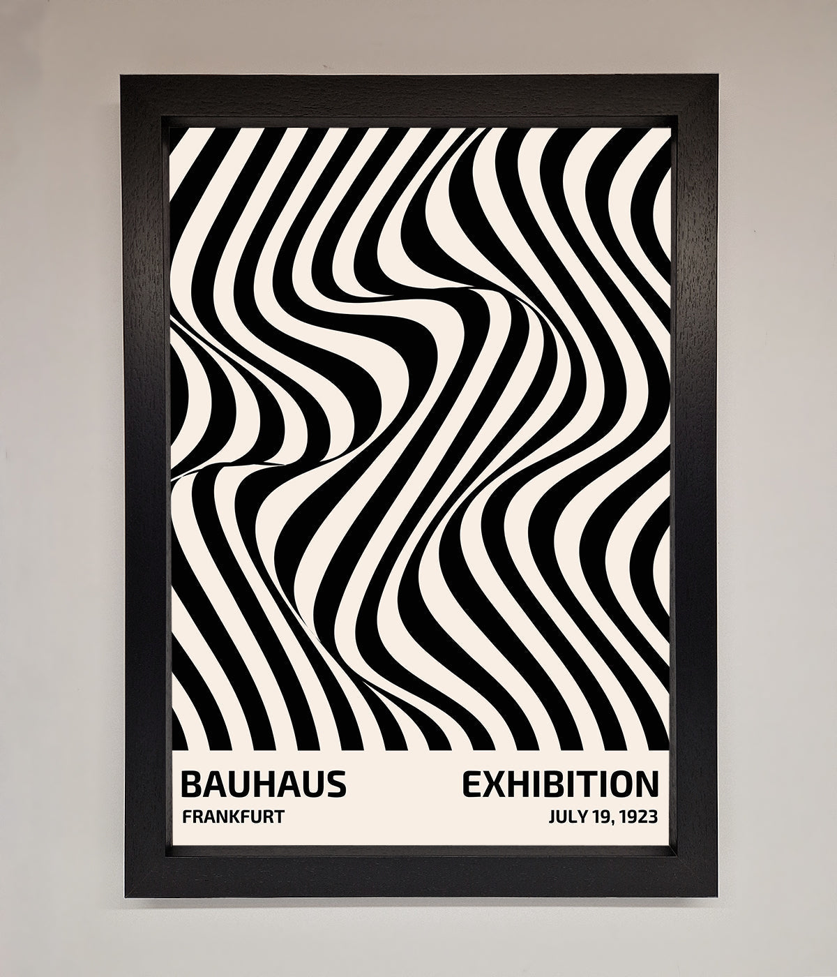 Bauhaus poster with wavy black lines in a sleek black frame.