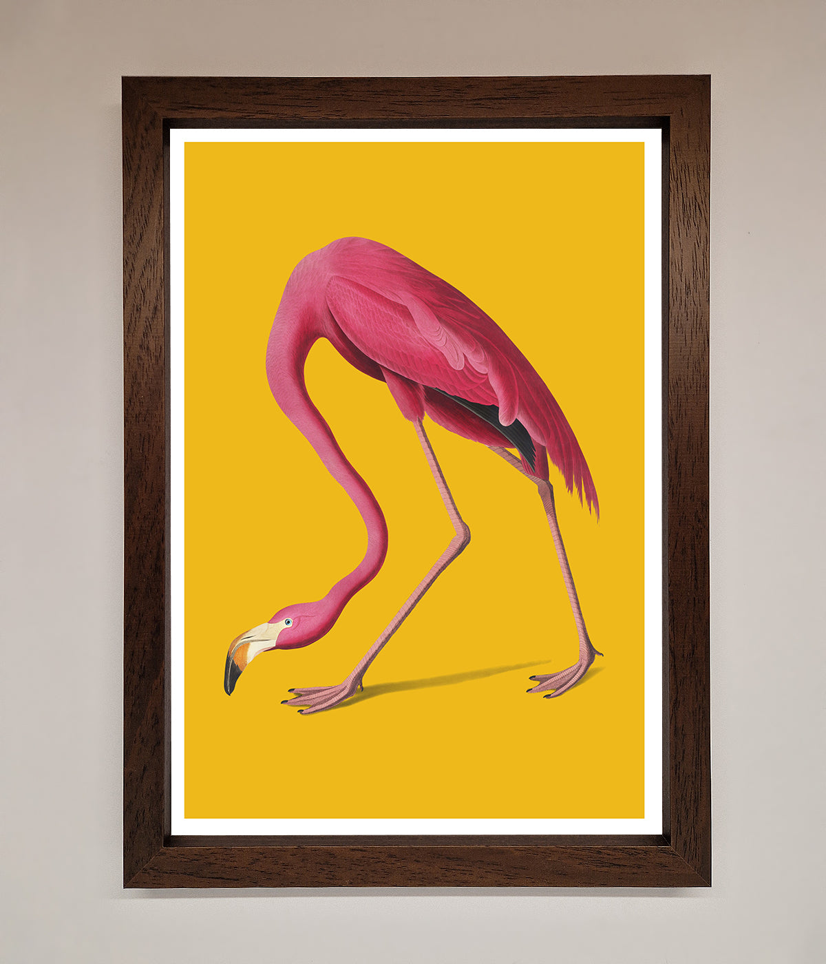 Pink Flamingo On Yellow Framed Print for vibrant home decor.