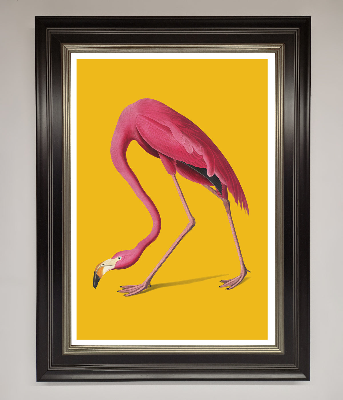 Pink Flamingo on Yellow Framed Print for vibrant room decor.