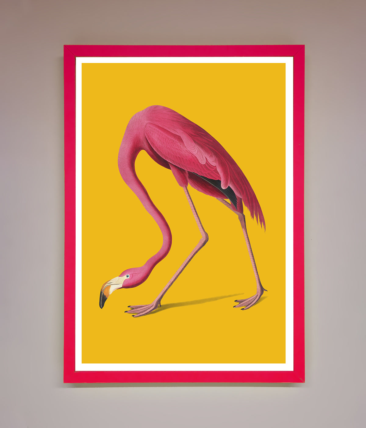 Pink Flamingo on yellow framed print artwork.