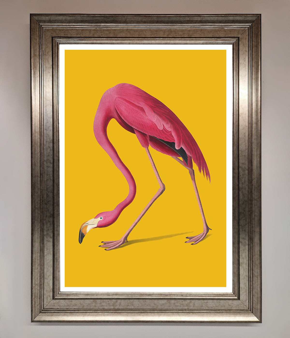 Pink Flamingo On Yellow framed print adding vibrant color to any room.