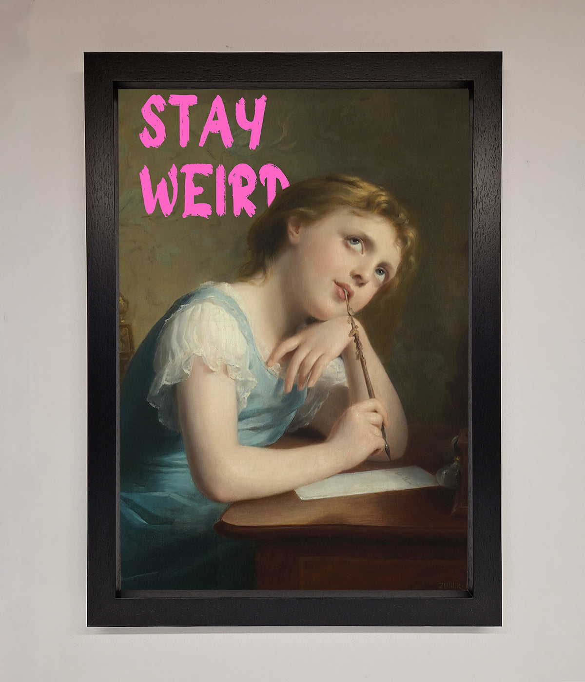 Stay Weird framed print featuring a contemplative woman.