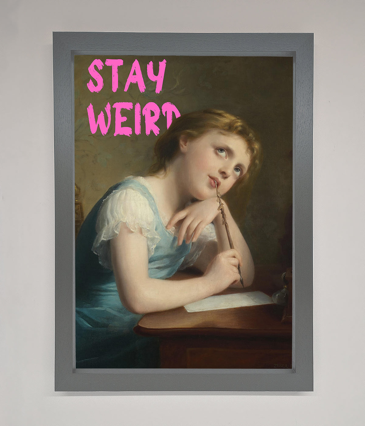 Stay Weird framed print with a thoughtful girl in blue dress.