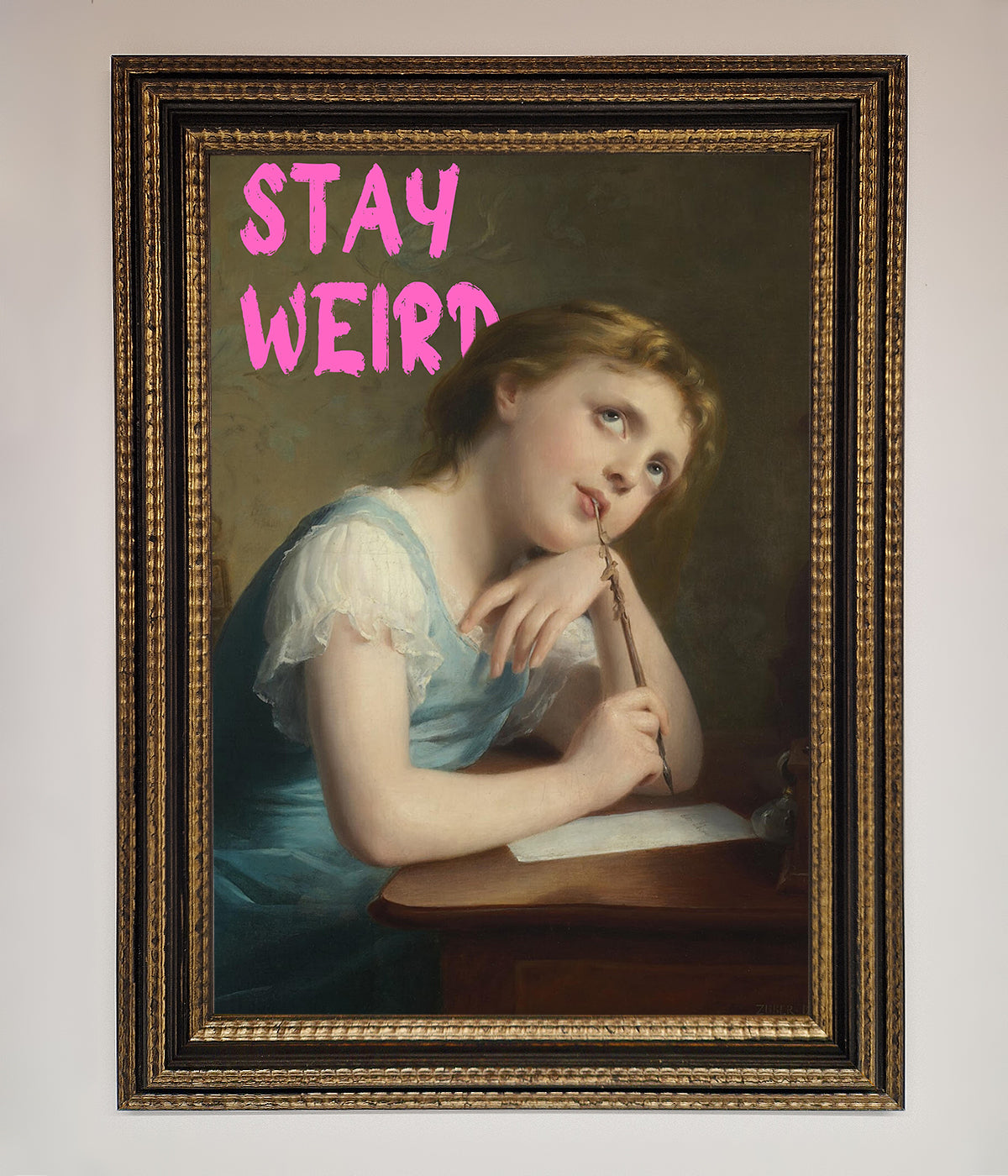 Stay Weird framed print featuring a vintage-style painting with text.