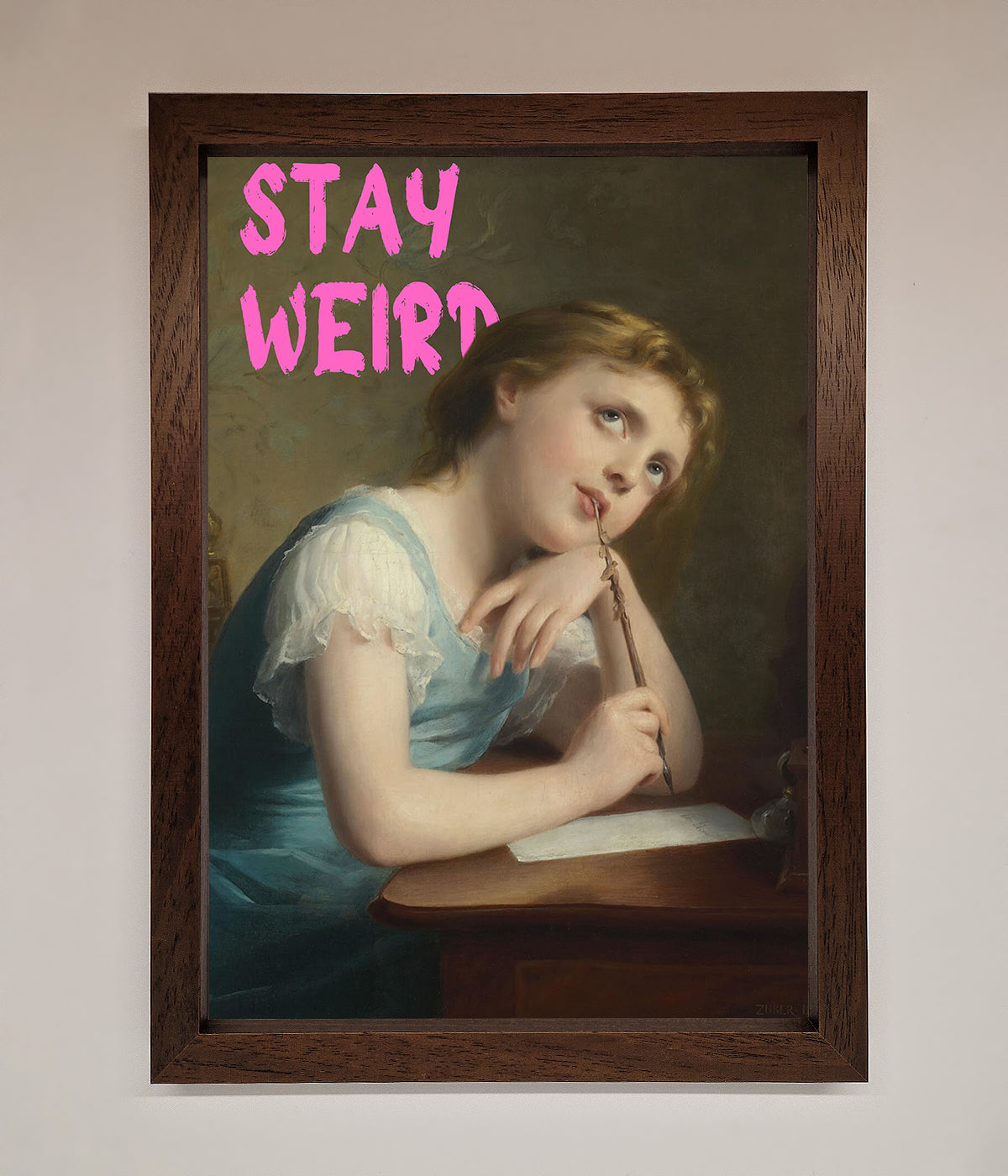 Stay Weird framed print with vintage artwork.