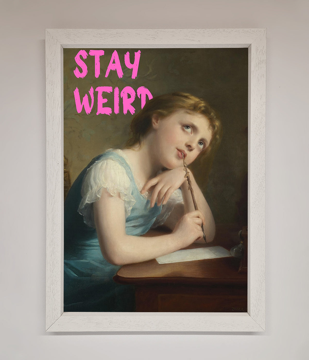 Stay Weird framed print featuring a contemplative figure.