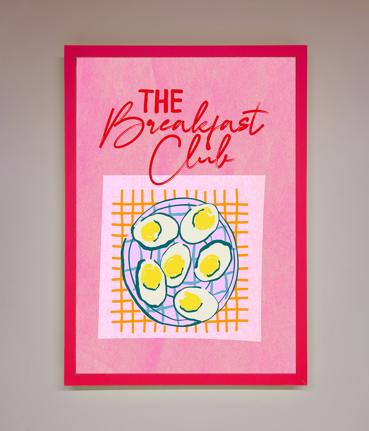 The Breakfast Club framed wall art with retro design and pink background.