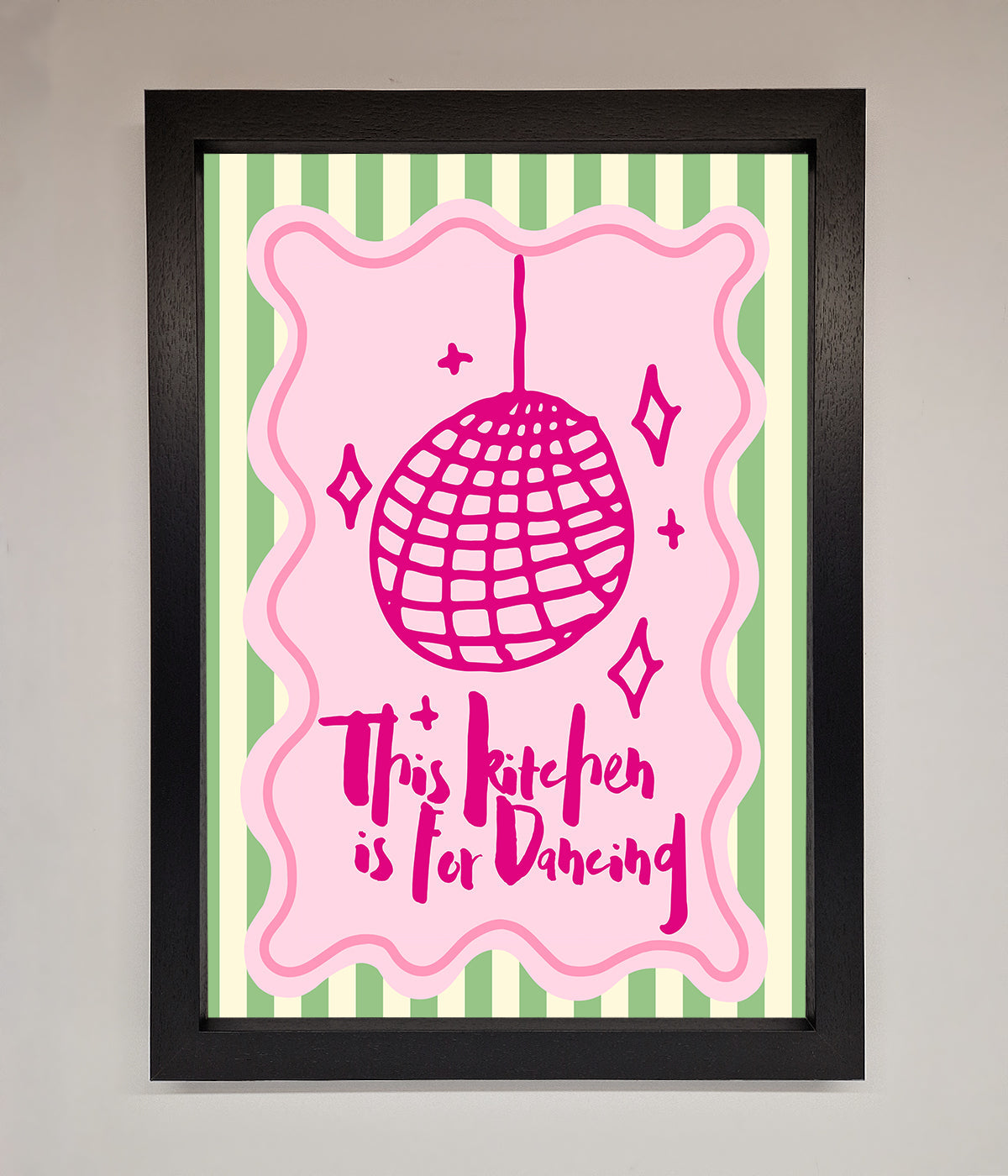 This Kitchen Is For Dancing framed wall art with pink and green design.