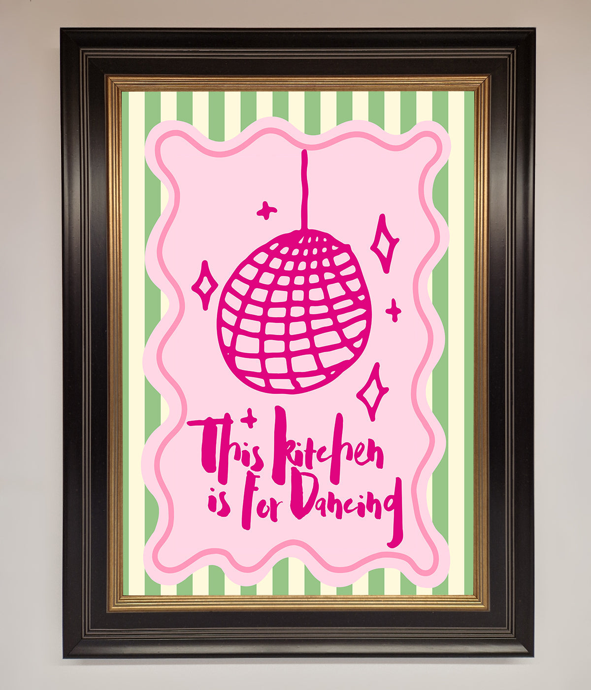 This Kitchen Is For Dancing framed wall art in whimsical pink and green design.