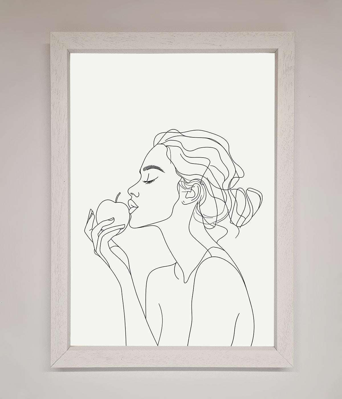 Line drawing of a woman holding an apple in a framed poster.