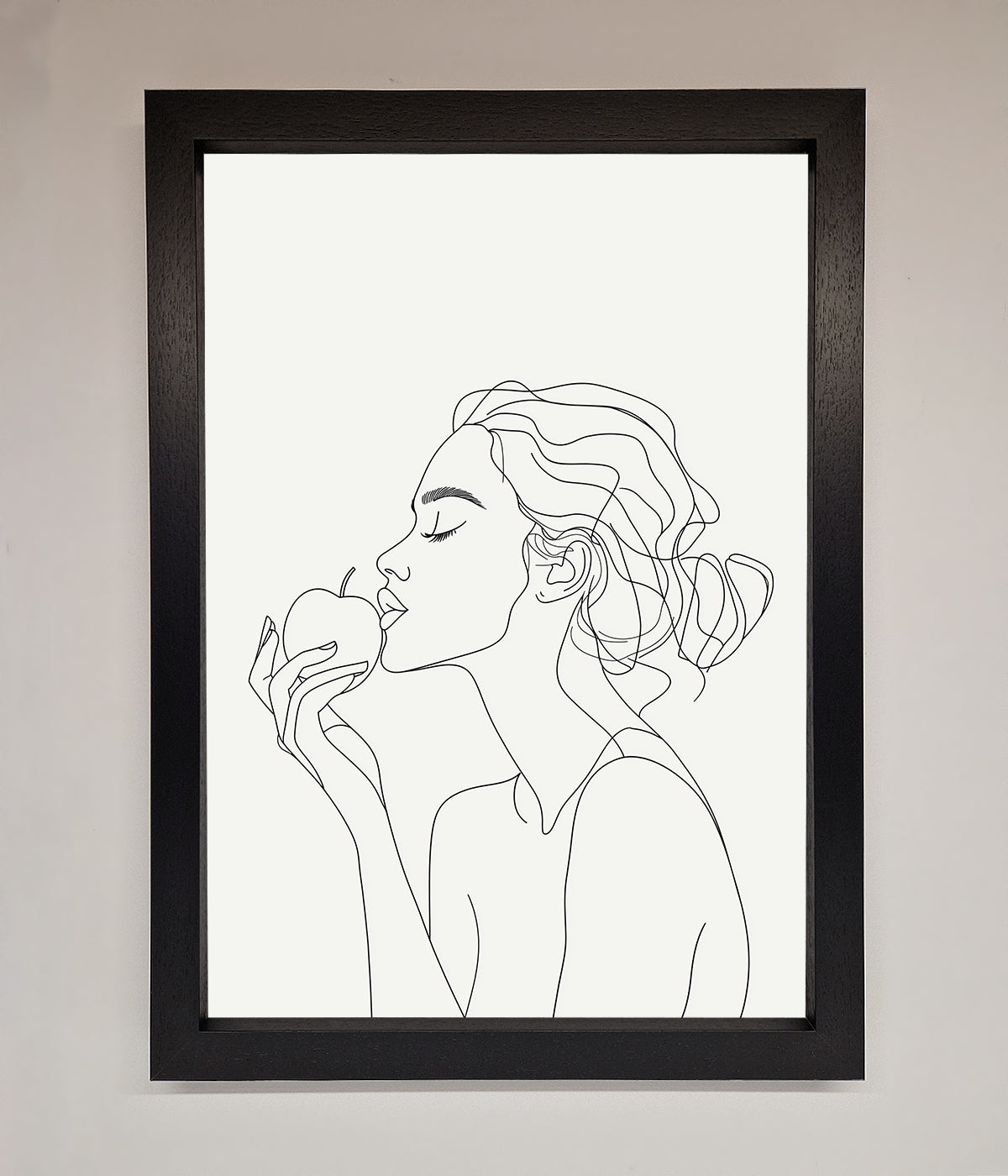 Line drawing of a woman with an apple, framed poster, elegant and modern design.