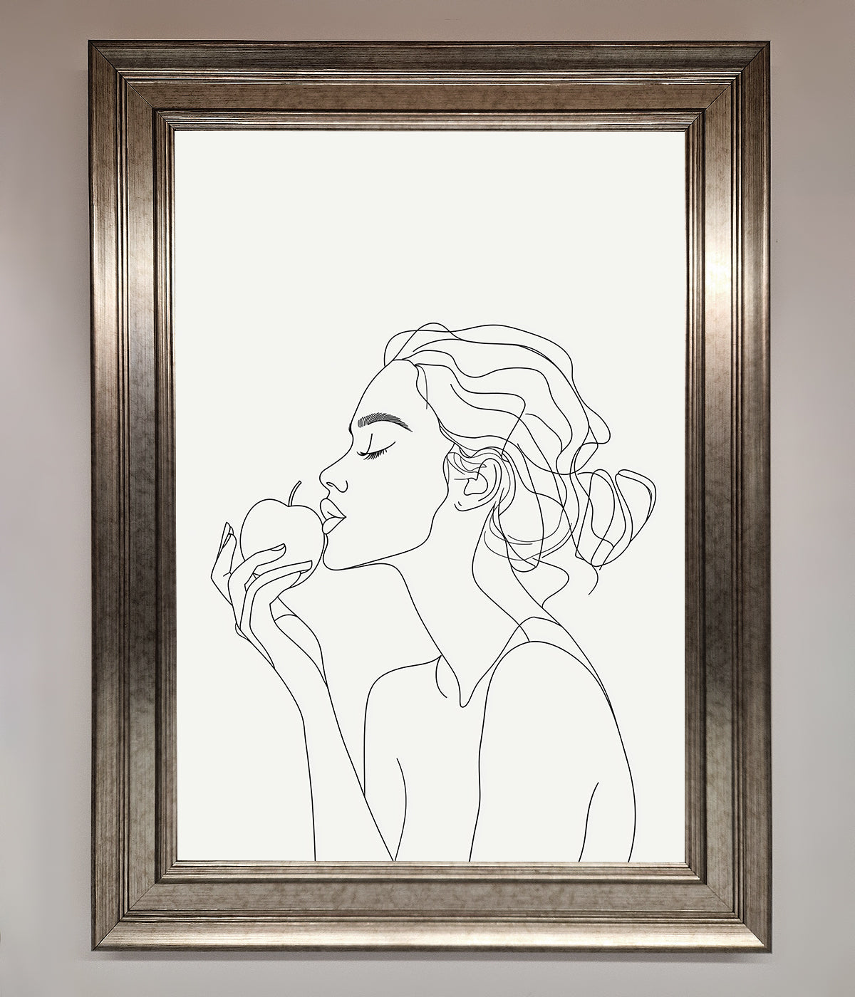 Line drawing of a woman holding an apple in an elegant framed poster.